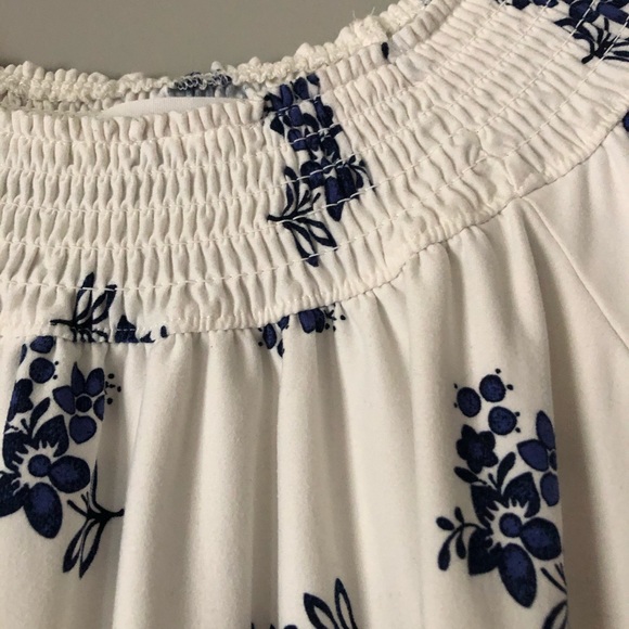 White longer sleeve shirt with blue flowers - Picture 6 of 8